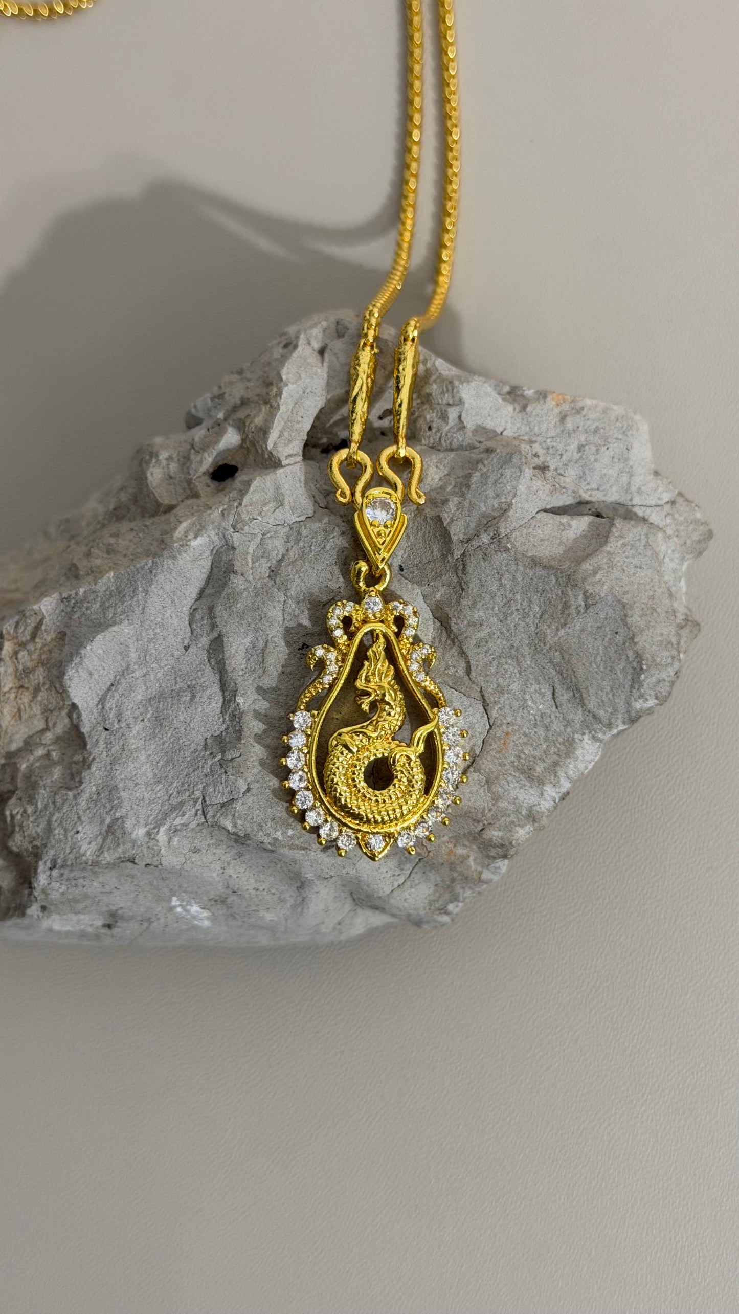 Gold Zircon Nak Pendant