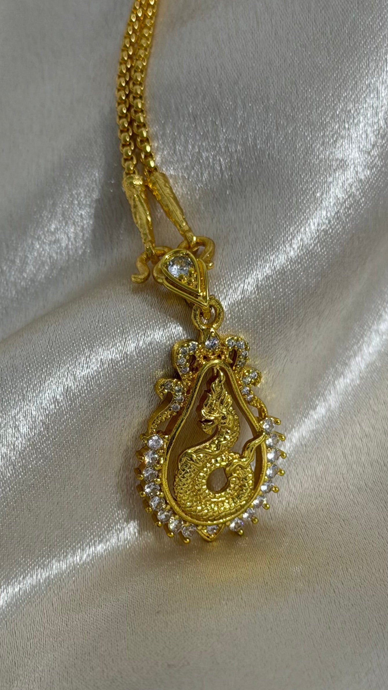 Gold Zircon Nak Pendant